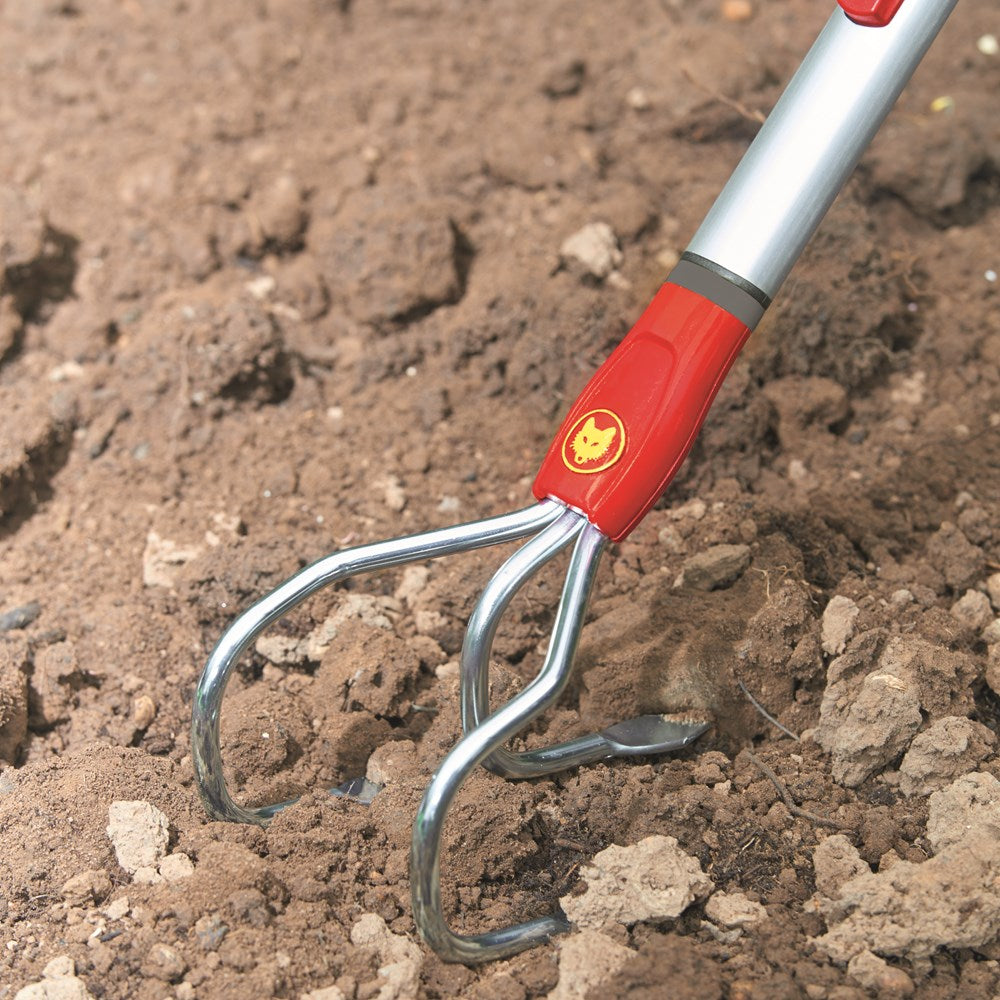 WOLF-Garten BEM Cultivator in soil bed with handle attached