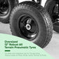 Close-up of oversized 12-inch robust all-terrain pneumatic tires with text highlighting their durability and adaptability.